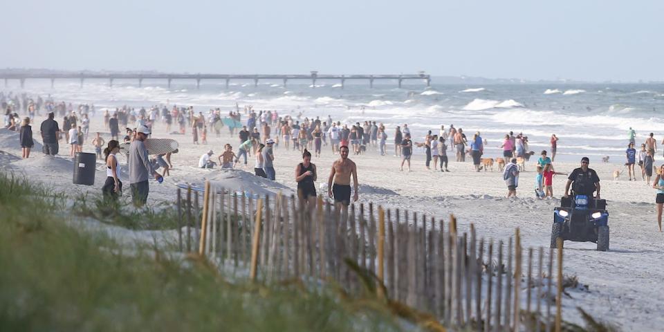 People crowded the beaches in its first open hour on April 17, 2020 in Jacksonville Beach, Fl.