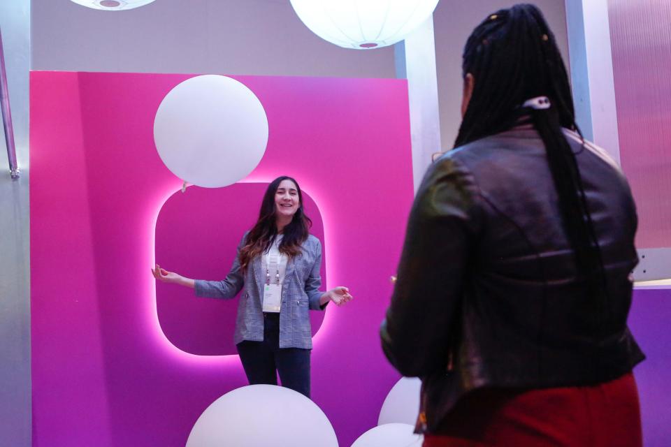 Attendees take selfies with balloons in an Instagram booth at the Facebook F8 Conference at McEnery Convention Center in San Jose, California, on April 30, 2019. - Got a crush on another Facebook user? The social network will help you connect, as part of a revamp unveiled Tuesday that aims to foster real-world relationships and make the platform a more intimate place for small groups of friends. (Photo by Amy Osborne / AFP)        (Photo credit should read AMY OSBORNE/AFP via Getty Images)