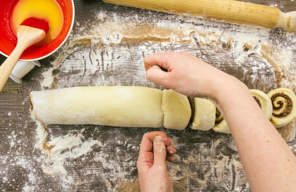 Cut cinnamon rolls with floss