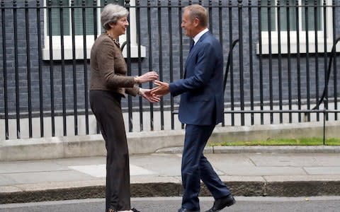 European Council President Donald Tusk meets British Prime Minister Theresa May  - Credit: AP/Frank Augstein