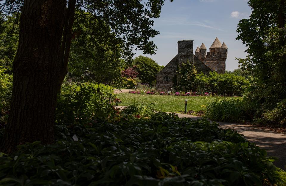 A shaded pathway at Yew Dell Botanical Gardens leads to the Castle Terrace, a stone castle that was hand-built in the 1950's. June 14, 2022