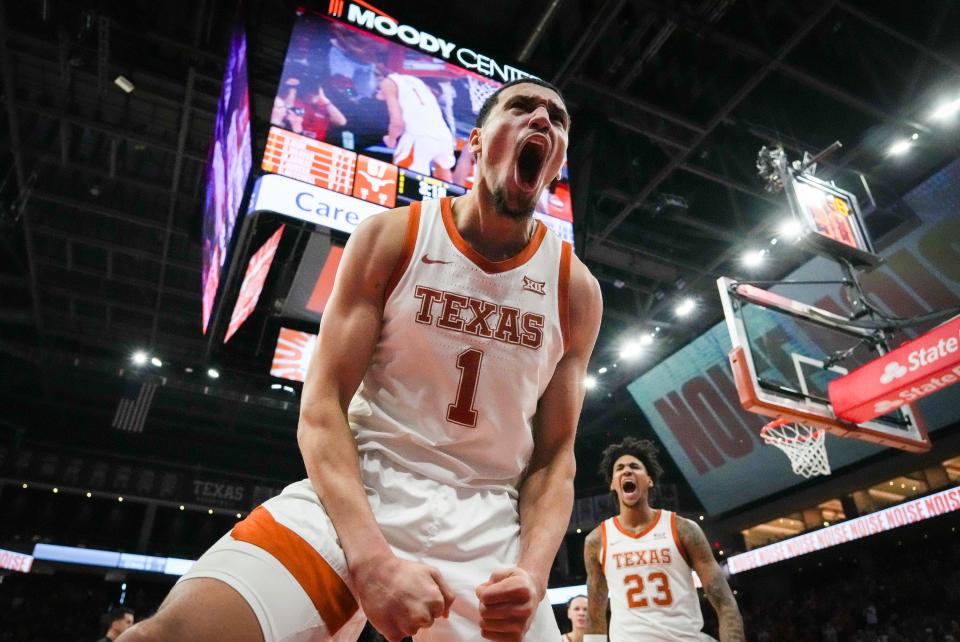Texas forward Dylan Disu celebrates a foul call during the second half of the Longhorns' 75-73 win over No. 9 Baylor on Saturday. It was Texas' first win over a ranked team this season.