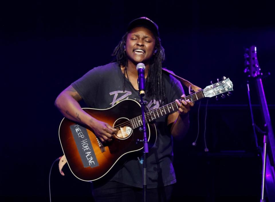 NASHVILLE, TENNESSEE - MARCH 20: Joy Oladokun performs onstage during the Love Rising: Let Freedom Sing (and Dance) A Celebration Of Life, Liberty And The Pursuit Of Happiness show at Bridgestone Arena on March 20, 2023 in Nashville, Tennessee. (Photo by Jason Kempin/Getty Images)