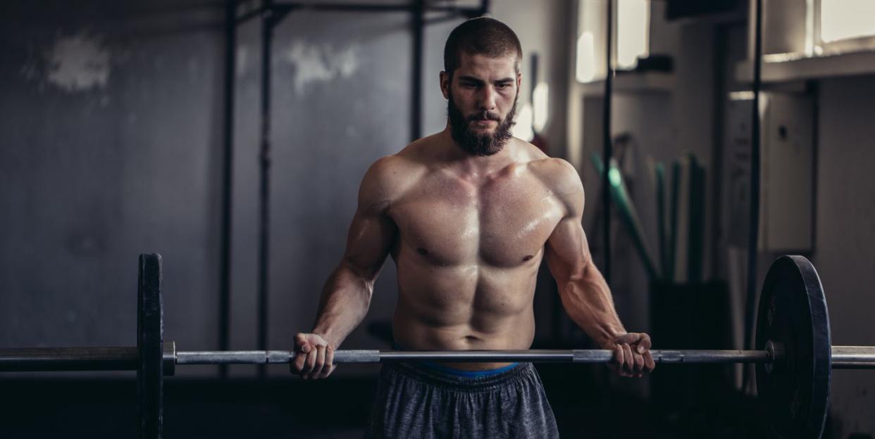 bodybuilder exercising in the gym