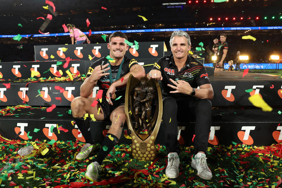 SYDNEY, AUSTRALIA - OCTOBER 01:  Nathan Cleary of the Panthers pose with the Provan-Summons Trophy with his father and coach Ivan Cleary after winning the 2023 NRL Grand Final match between Penrith Panthers and Brisbane Broncos at Accor Stadium on October 01, 2023 in Sydney, Australia. (Photo by Matt King/Getty Images)