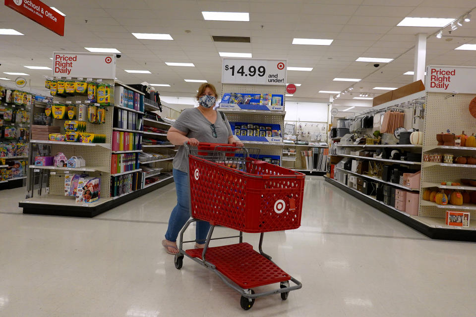 MIAMI, FLORIDA - SEPTEMBER 28: Consumers shop in a Target store on September 28, 2021 in Miami, Florida.The Conference Board&#39;s Consumer Confidence Index released today indicated that consumer confidence fell for the third consecutive month in September, to 109.3 from 115.2 in August. (Photo by Joe Raedle/Getty Images)