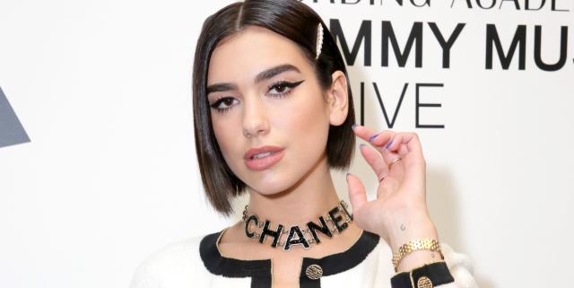 Dua Lipa's Rolling Stone Cover Includes a Barely-There Outfit & Tights –  Footwear News