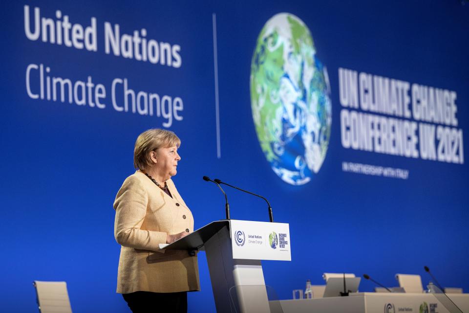 German Chancellor Angela Merkel speaks during the UN Climate Change Conference (via REUTERS)