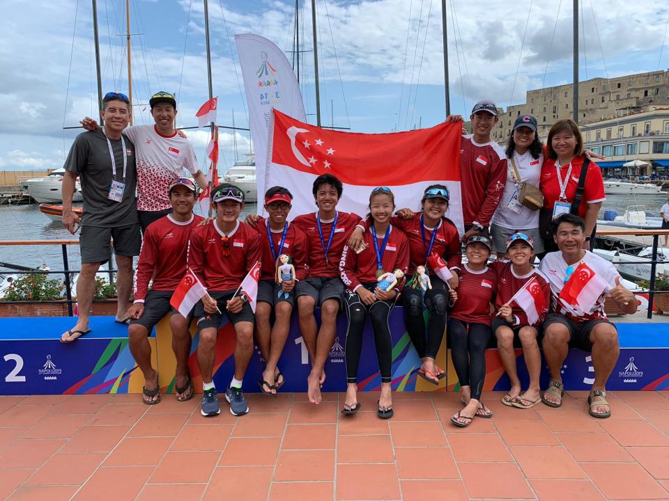The bronze-winning Singapore sailing team with their fellow team-mates at the World University Games. (PHOTO: International University Sports Federation)