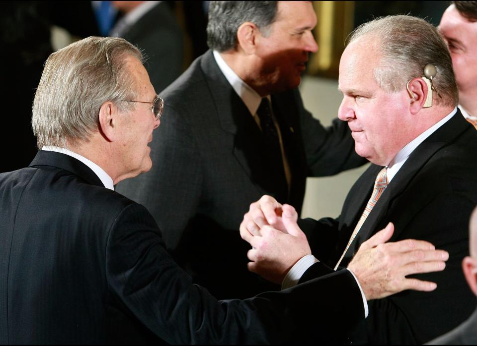 WASHINGTON - JANUARY 13:  Former U.S. Secretary of Defense Donald Rumsfeld (L) talks with radio talk show host Rush Limbaugh (R) before the start of a Medal of Freedom ceremony at the White House January 13, 2009 in Washington DC. During the ceremony U.S. President George W. Bush presented the Medal of Freedom to former British Prime Minister Tony Blair,  former Australian Prime Minister John Howard and Colombian President Alvaro Uribe.  (Photo by Mark Wilson/Getty Images)