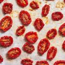 <p>We LOVE having these flavourful sun-dried tomatoes on hand. Stir them into your <a href="https://www.delish.com/uk/cooking/recipes/a29099239/best-homemade-fettuccine-alfredo-recipe/" rel="nofollow noopener" target="_blank" data-ylk="slk:fettuccine alfredo;elm:context_link;itc:0;sec:content-canvas" class="link ">fettuccine alfredo</a>, slice them and add them to your <a href="https://www.delish.com/uk/cooking/recipes/a29260396/chicken-caesar-pasta-salad-recipe/" rel="nofollow noopener" target="_blank" data-ylk="slk:caesar salad;elm:context_link;itc:0;sec:content-canvas" class="link ">caesar salad</a>, or just snack on 'em plain! </p><p>Get the <a href="https://www.delish.com/uk/cooking/recipes/a33070295/sun-dried-tomatoes-recipe/" rel="nofollow noopener" target="_blank" data-ylk="slk:Sun-Dried Tomatoes;elm:context_link;itc:0;sec:content-canvas" class="link ">Sun-Dried Tomatoes</a> recipe.</p>