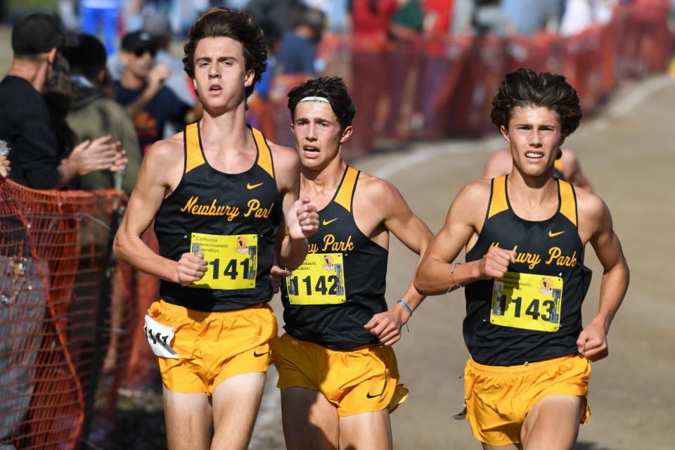 Colin Sahlman (left to right), Leo Young and Lex Young led the Newbury Park boys cross country team to a historic season.