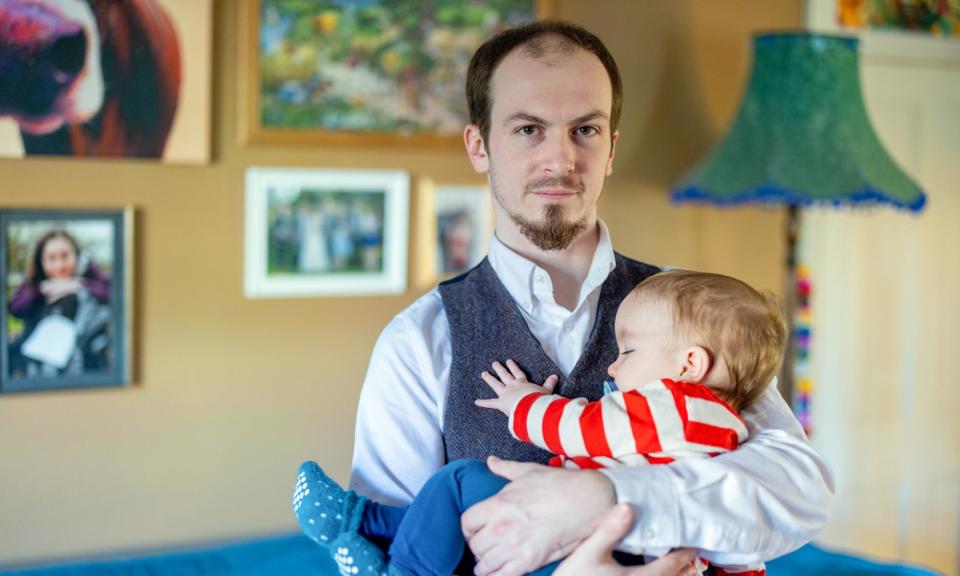 <span>Aaron Horsey with his son Tim. The paternity leave (bereavement) bill was one of the last bills passed before the general election.</span><span>Photograph: Millie Pilkington/The Guardian</span>