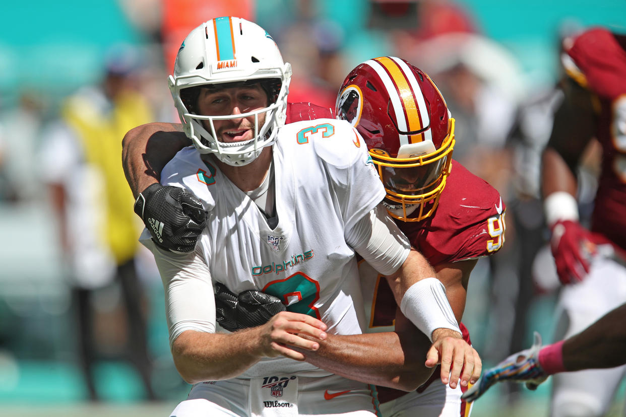 Josh Rosen had a miserable day on the field before watching Miami's comeback fall short from the sideline. (Getty)