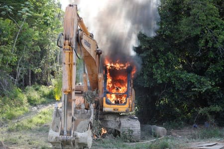 Heavy machinery is destroyed during an operation conducted by Brazilian Institute for the Environment and Renewable Natural Resources (IBAMA) and Federal Police at an illegal gold mine near the city of Altamira