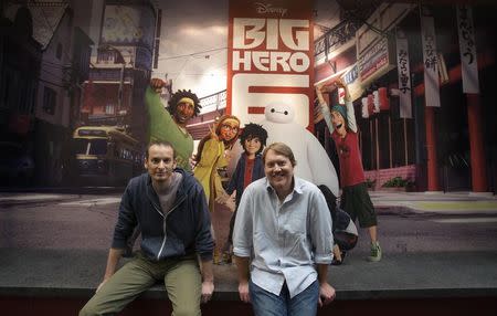 Directors of the animated movie "Big Hero 6" Don Hall (R) and Chris Williams pose for a portrait at Disney Animation Studios in Burbank, California September 29, 2014. REUTERS/Mario Anzuoni