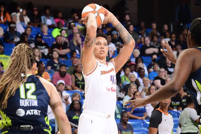 <p>Michael Gonzales/NBAE via Getty</p> Brittney Griner