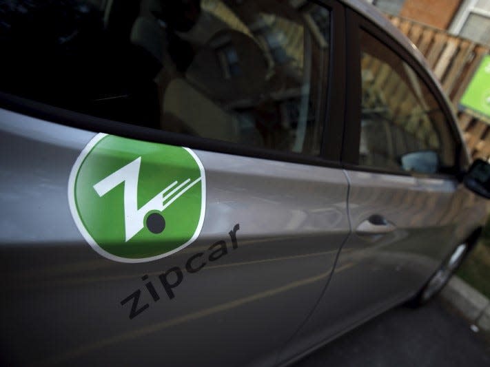 FILE PHOTO: A zipcar vehicle is seen parked in downtown Washington, September 1, 2015.  REUTERS/Carlos Barria 