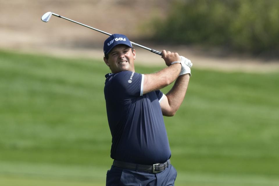 Patrick Reed of the U.S. plays his second shot on the 9th hole during the final round of the Dubai Desert Classic, in Dubai, United Arab Emirates, Monday, Jan. 30, 2023. (AP Photo/Kamran Jebreili)