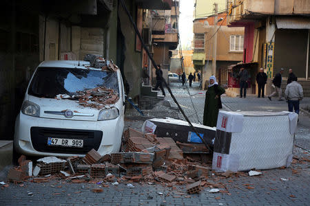 A damaged vehicle is seen after a blast in the Kurdish-dominated southeastern city of Diyarbakir, Turkey, November 4, 2016. REUTERS/Sertac Kayar