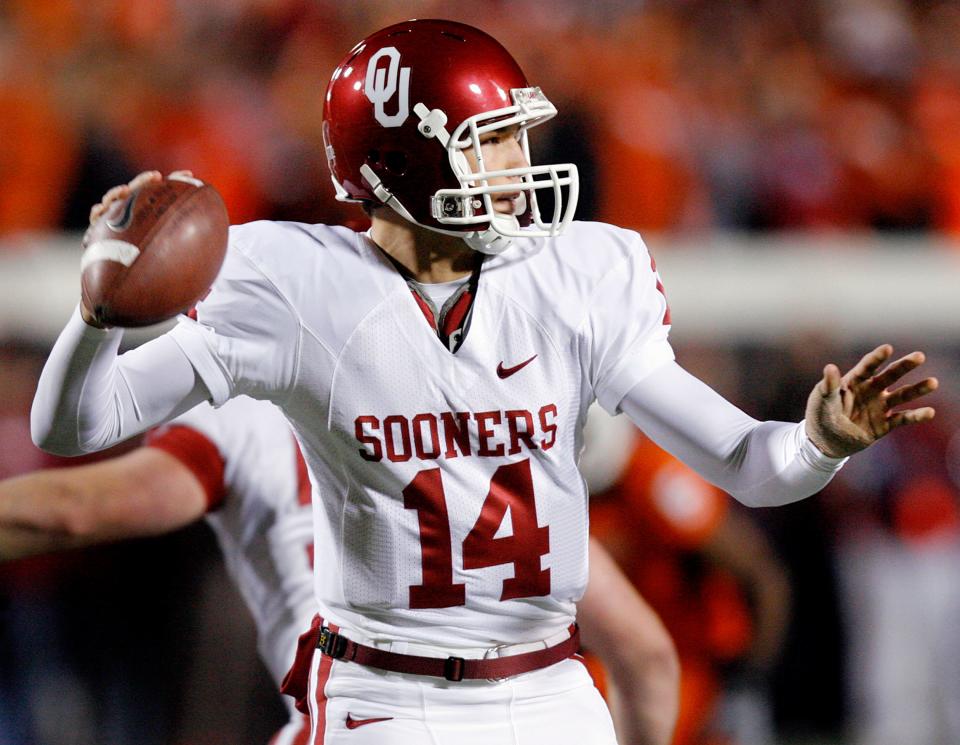 OU's Sam Bradford looks to throw during a game against Oklahoma State at Boone Pickens Stadium in Stillwater on Nov. 29, 2008.