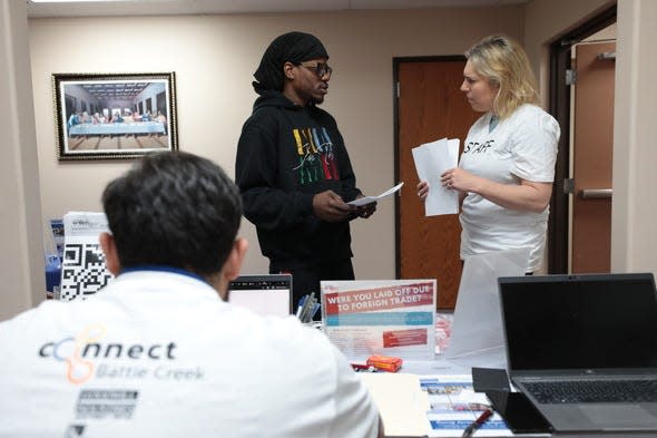 Michigan Department of State staff assist residents with restoring their driving privileges during a free clinic Wednesday, May 8, 2024 at Second Missionary Baptist Church in Battle Creek.