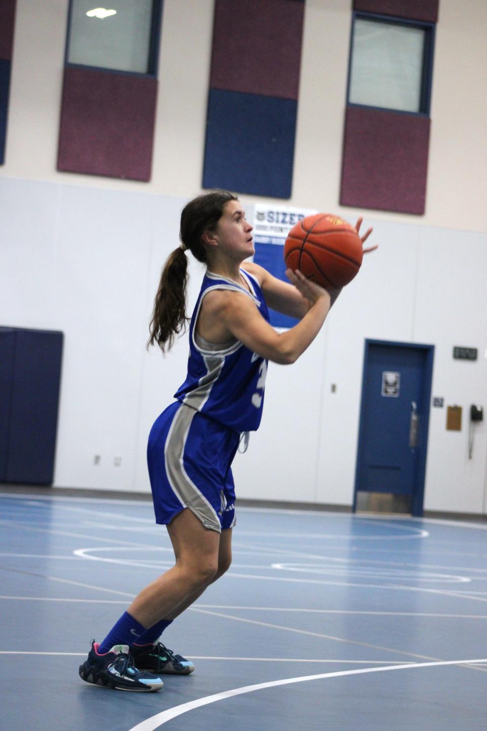 Warriors guard Abigail Billiel shoots a three-pointer in a game against Sizer on January 3, 2024.