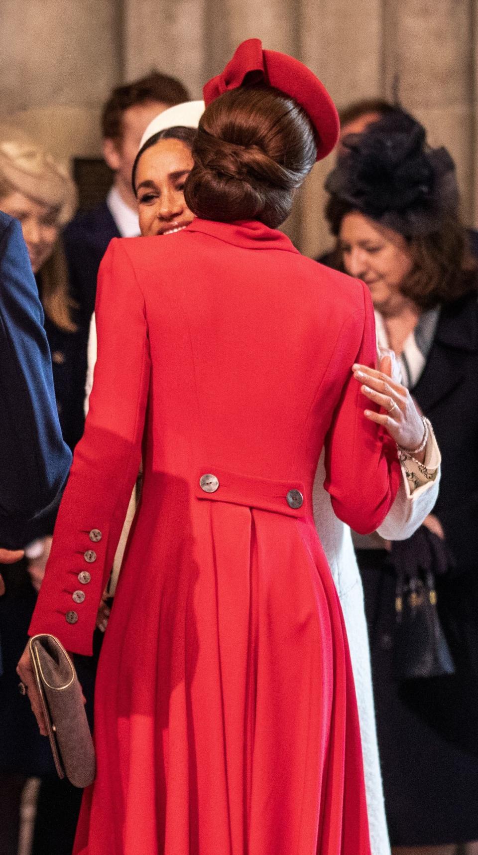 The two women embracing.&nbsp; (Photo: RICHARD POHLE via Getty Images)