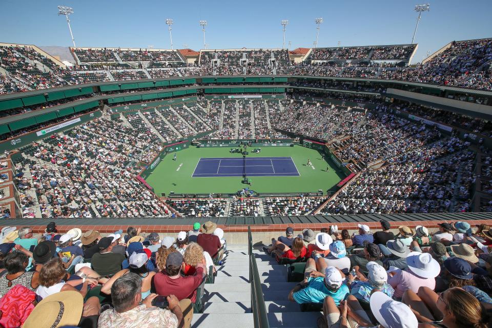 A large crowd watches the men’s semifinal match between Francis Tiafoe and Daniil Medvedev during the BNP Paribas Open at the Indian Wells Tennis Garden in Indian Wells, Calif., March 18, 2023.