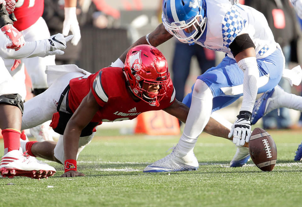 Louisville quarterback Lamar Jackson lost a fumble late against Kentucky and the Wildcats turned it into a game-winning field goal. (Getty)