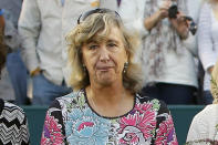 FILE - In this April 7, 2012, file photo, Kristy Pigeon, a member of the original nine women who helped start the women's professional tennis tour, is honored at the Family Circle Cup tennis tournament in Charleston, S.C. It’s the 50th anniversary of Billie Jean King and eight other women breaking away from the tennis establishment in 1970 and signing a $1 contract to form the Virginia Slims circuit. That led to the WTA Tour, which offers millions in prize money. (AP Photo/Mic Smith, File)