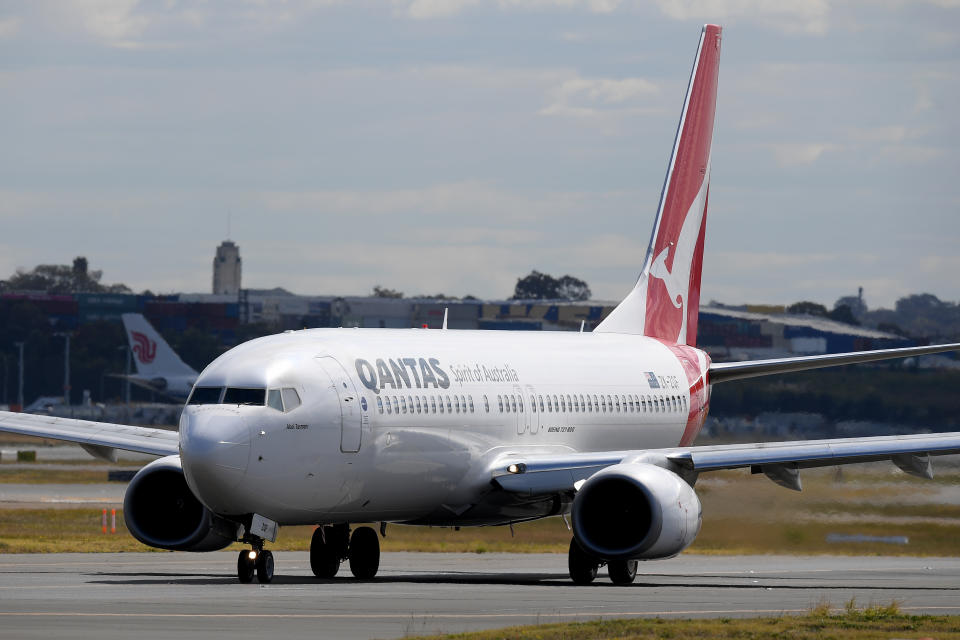 A Qantas Boeing 737-800 aircraft is seen taxiing at Sydney Airport,in 2018.