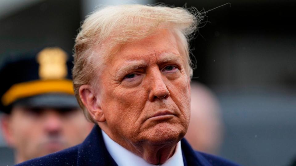 PHOTO: Former President Donald Trump listens during a news conference after attending the wake of New York City police officer Jonathan Diller, Mar. 28, 2024, in Massapequa Park, N.Y.  (Frank Franklin Ii/AP)