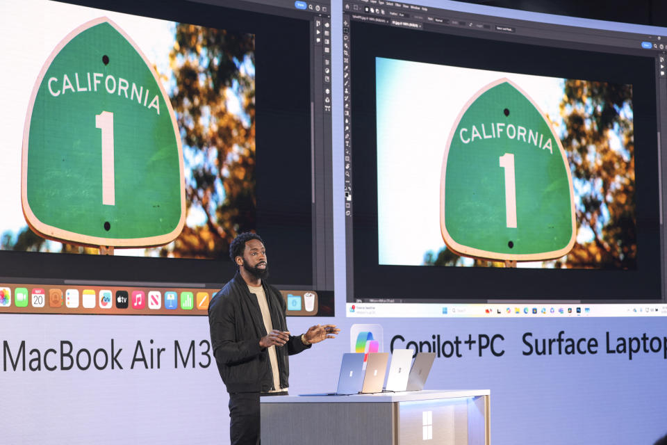 Microsoft Surface Senior Product Manager Oyin Shenbanjo explains the new Surface Laptop compared to the MacBook Air M3 at the Microsoft Briefing event held at the Microsoft Campus in Redmond, Washington on May 20, 2024.  (Photo: Jason Redmond / AFP) ) (Photo: JASON REDMOND/AFP via Getty Images)