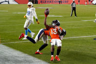 Denver Broncos wide receiver K.J. Hamler (13) celebrates his game-tying touchdown against the Los Angeles Chargers during the second half of an NFL football game, Sunday, Nov. 1, 2020, in Denver. The Broncos won 31-30. (AP Photo/David Zalubowski)