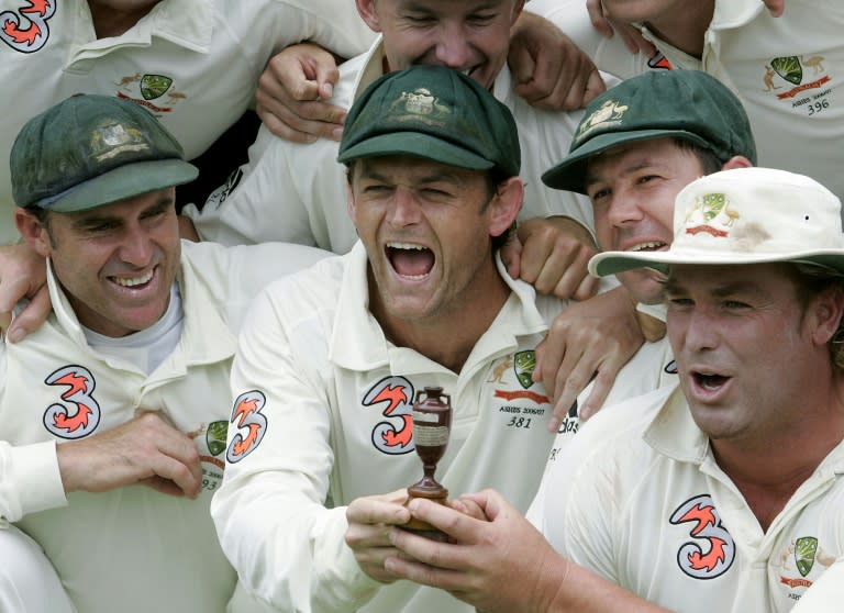 Jubilant Australian team members Matthew Hayden, Adam Gilchrist, captain Ricky Ponting and Shane Warne lift a replica Ashes urn after winning the 2006 WACA Test against England to clinch the series