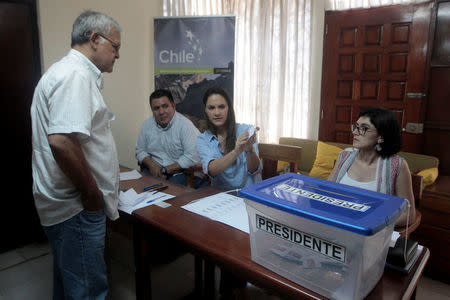 A Chilean residing in Nicaragua arrives to vote at a polling station during the presidential election in the Chilean Embassy in Managua, Nicaragua November 19, 2017. REUTERS/Oswaldo Rivas