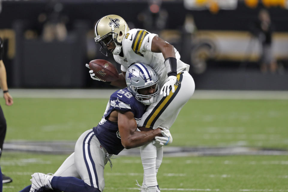 Dallas Cowboys defensive end Robert Quinn (58) sacks New Orleans Saints quarterback Teddy Bridgewater (5)in the first half of an NFL football game in New Orleans, Sunday, Sept. 29, 2019. (AP Photo/Bill Feig)