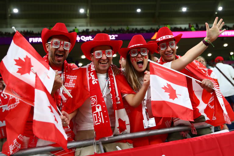 Fans from Canada cheer in the stands ahead of the FIFA World Cup Qatar 2022 Group F soccer match between Belgium and Canada at Ahmed bin Ali Stadium.