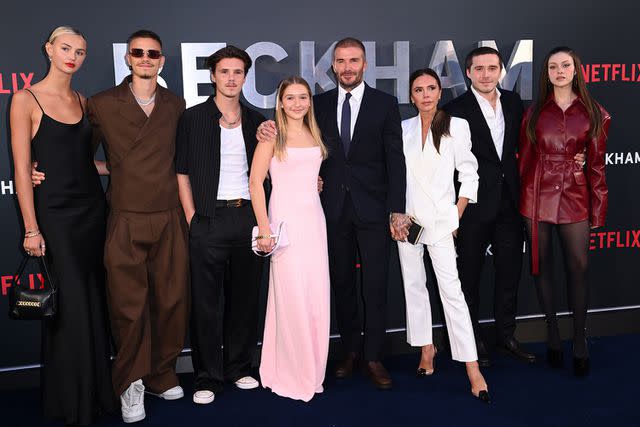 <p>Karwai Tang/WireImage</p> (L-R) Mia Regan, Romeo Beckham, Cruz Beckham, Harper Beckham, David Beckham, Victoria Beckham, Brooklyn Beckham and Nicola Peltz attend the Netflix 'Beckham' UK Premiere