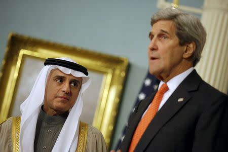 Saudi Foreign Minister Adel al-Jubeir stands next to U.S. Secretary of State John Kerry as he delivers a statement after a meeting at the State Department in Washington, February 8, 2016. REUTERS/Carlos Barria