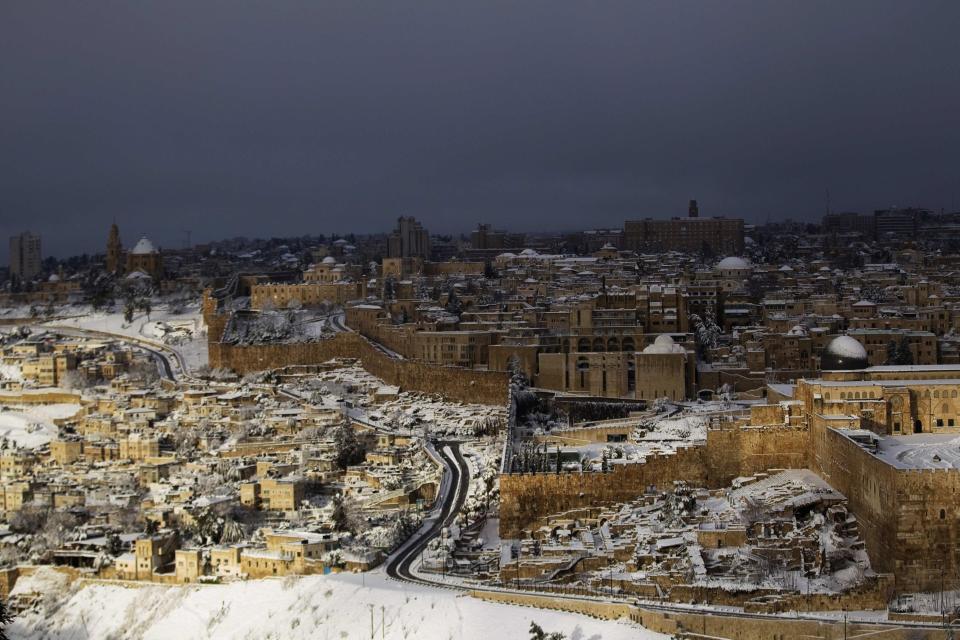 A view of Jerusalem's Old City following a snowstorm is seen from the Mount of Olives