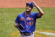 New York Mets starting pitcher Taijuan Walker walks to the dugout after being taken out in the bottom of the first inning after giving up six runs during a baseball game against the Pittsburgh Pirates in Pittsburgh, Sunday, July 18, 2021. (AP Photo/Gene J. Puskar)