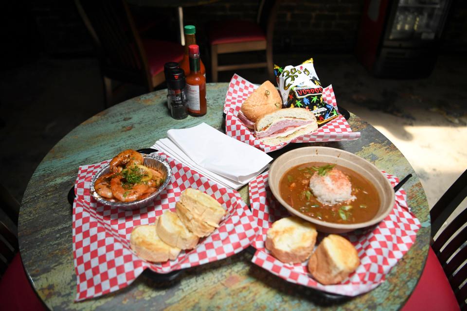 Barbeque shrimp, chicken and sausage gumbo, and a muffuletta sandwich are among the specialties at Saint Lucille’s Kitchen.