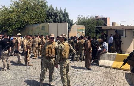 Kurdish security forces gather near an Erbil governorate building in Erbil, Iraq July 23, 2018. REUTERS/Azad Lashkari