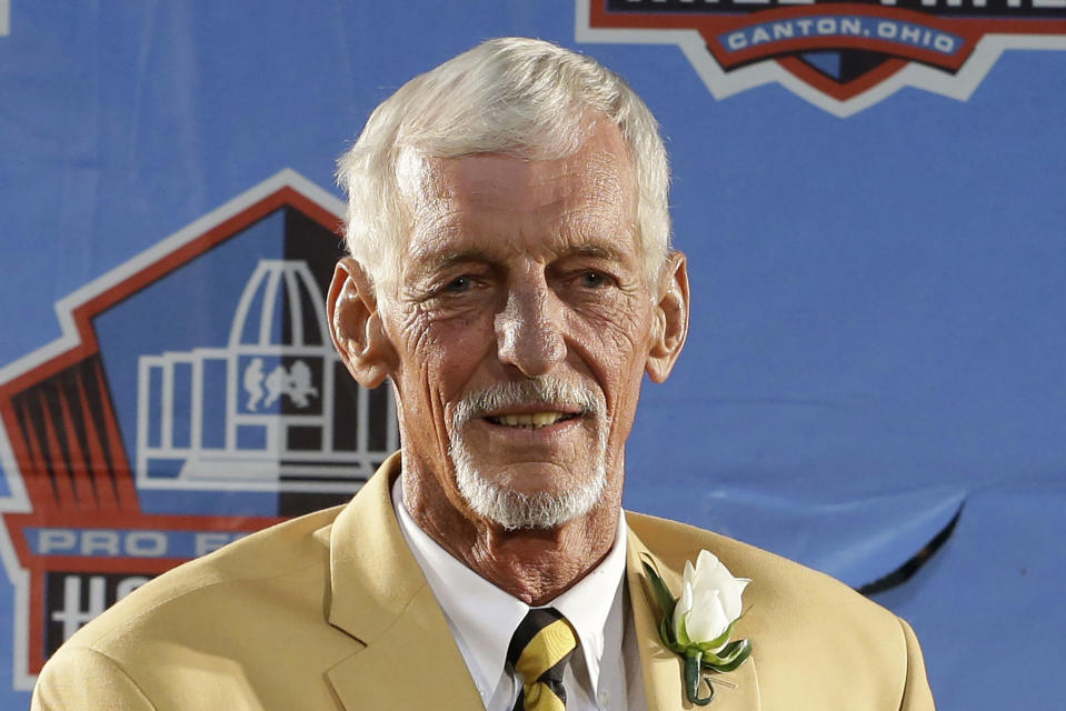 FILE - Hall of Fame inductee Ray Guy poses during the 2014 Pro Football Hall of Fame Enshrinement Ceremony at the Pro Football Hall of Fame, Saturday, Aug. 2, 2014, in Canton, Ohio. Ray Guy, the first punter to make the Pro Football Hall of Fame, died Thursday, Nov. 3, 2022, following a lengthy illness. He had been receiving care in a Hattiesburg, Miss. area hospice. He was 72. (AP Photo/Tony Dejak, File)