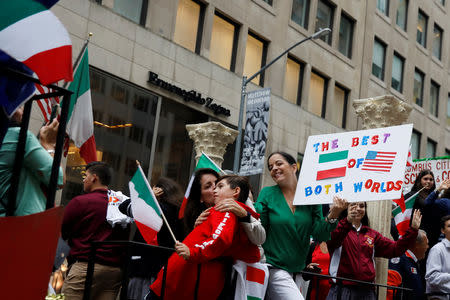 People participate in the 74th Annual Columbus Day Parade in Manhattan, New York, U.S., October 8, 2018. REUTERS/Shannon Stapleton