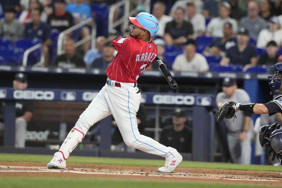 Miami Marlin' Luis Arraez hits a two-run home run during the first inning of a baseball game against the New York Yankees, Saturday, Aug. 12, 2023, in Miami. (AP Photo/Marta Lavandier)