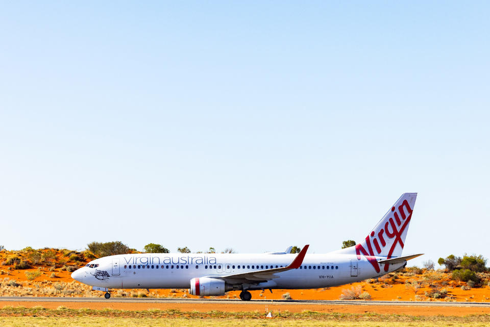 Virgin Australia flight landing in Ayers Rock airport