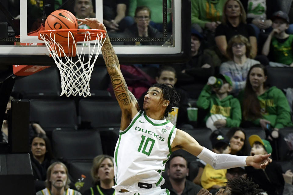 FILE Oregon center Kel'el Ware (10) tries to score against Oregon State during the second half of an NCAA college basketball game Dec. 31, 2022, in Eugene, Ore. Ware will play at Indiana this season after transferring from Oregon. (AP Photo/Andy Nelson, file)